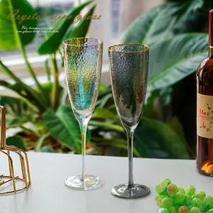Elegant colorful crystal wine glasses with hammered texture for luxury dining