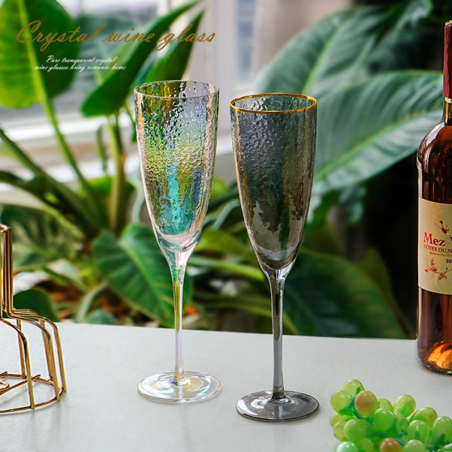Elegant colorful crystal wine glasses with hammered texture for luxury dining