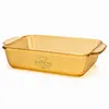 Extra large 4.1L amber rectangular borosilicate glass baking dish with vertical fluted texture and integrated side handles for family cooking.