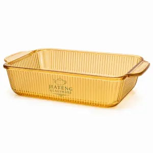 Extra large 4.1L amber rectangular borosilicate glass baking dish with vertical fluted texture and integrated side handles for family cooking.