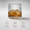 Scenic base whiskey tumbler with three dimensional mountain inspired interior design