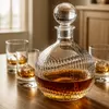 Whiskey decanter serving set with four old fashioned glass tumblers