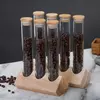 Elegant coffee bean glass storage tubes designed for modern coffee stations and kitchens
