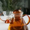 Premium handmade glass teapot with amber lid and ergonomic handle for daily tea brewing