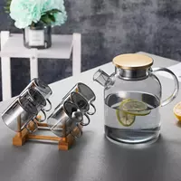 Premium wide mouth borosilicate glass water carafe with stainless steel lid for daily beverage serving
