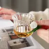 Creative handmade borosilicate glass tea cup with floral design for premium drink presentation