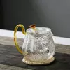 Elegant clear glass teapot for loose leaf and herbal tea brewing