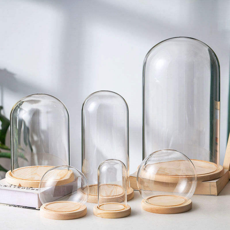 Jiateng clear glass dome with natural wooden base, perfect for displaying collectibles, ornaments, or desserts, stylish and modern