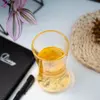 Minimalist clear glass cup suitable for tea, juice, coffee, and water