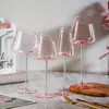 Modern pink crystal wine glass goblet on marble table for home dining and wedding decoration