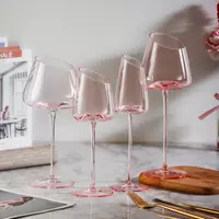 Modern pink crystal wine glass goblet on marble table for home dining and wedding decoration
