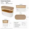 Front view of 1090ml oval food storage container measuring 22.4cm long and 7.6cm high with transparent amber body and white base