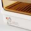 Large 1750ml stackable food storage container measuring 22.4 by 16.1 by 7.6cm with transparent amber section and removable inner tray.