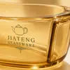 Heat resistant amber oval glass baking dish designed for oven cooking with a maximum stated temperature of 400 degrees Celsius.