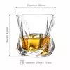 Clear sculpted whiskey glass with distinctive twisted base and modern tumbler shape