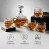 Textured whiskey serving set with decorative decanter and four matching rock glasses