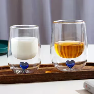 Heart double wall glass cup with blue heart design for tea and milk