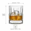 Clear diamond pattern whiskey tumbler with decorative textured band for spirits