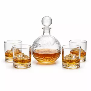 Round whiskey decanter set with four old fashioned whiskey glasses