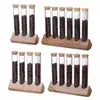 Premium glass coffee bean storage tube set with bamboo lids and wooden display stand