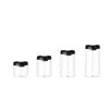 Modern glass coffee canister featuring a one-touch vacuum sealing lid for coffee storage