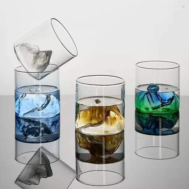 Jiateng creative color ice cubes whiskey glass with blue liquid and clear ice, perfect for cocktails, home bar, or as a decorative statement piece.