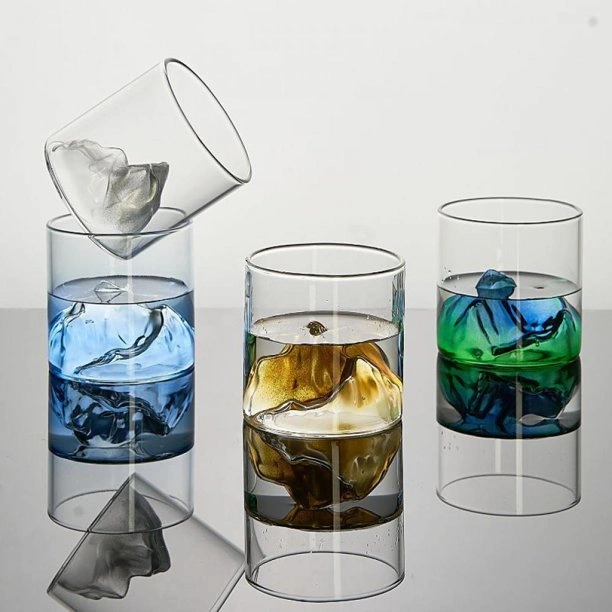 Jiateng creative color ice cubes whiskey glass with blue liquid and clear ice, perfect for cocktails, home bar, or as a decorative statement piece.
