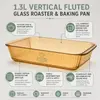 Close view of the vertical fluted exterior texture on a 1.3L amber borosilicate glass baking dish with a shallow rectangular body.